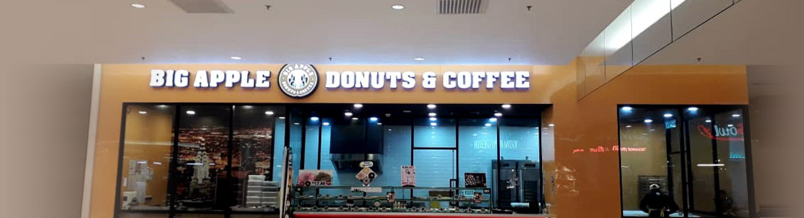 Big Apple Donuts & Coffee's store signage